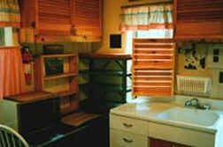 nature retreat: kitchen in cabins 2 in the forest on the river, near crater lake national park, hiking trails, train mountain, wood river wetlands, national wildlife refuges, klamath basin birding trails in the pacific flyway of southern oregon; the retreat is surrounded by winema national forest in the cascade mountains.