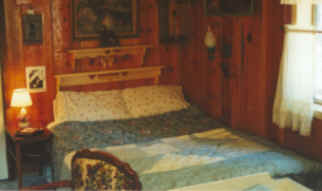 cabins: the bedroom-livingroom in cabin 5 at the retreat in southern oregon, nestled in winema national forest, located in the pacific flyway of southern oregon, northern california with crater lake national park, national wildlife refuges, wetlands, klamath basin birding trails nearby.
