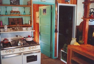 Kitchen in the cottage at the retreat in southern oregon near crater lake national park, klamath basin birding trails, wood river wetlands, national wildlife refuges offering cabins, tree houses and vacation rentals, surrounded by winema national forest with hiking trails, wilderness areas and mountain lakes.