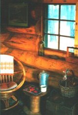 interior of the log cabin in the forest at the retreats in oregon: cabins, tree houses, vacation rentals not far from crater lake national park, klamath basin birding trails, wetlands, national wildlife refuges in the pacific flyway of southern oregon, surrounded by winema national forests with mountain lakes, hiking trails, wilderness areas.